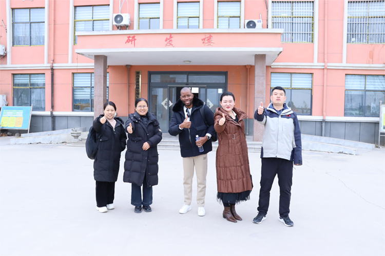 Sales team and customers group photo