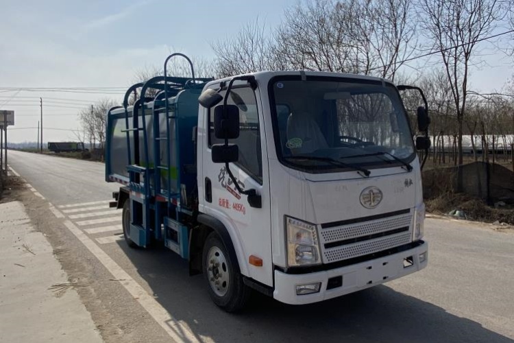 Truk Sampah Ember Gantung