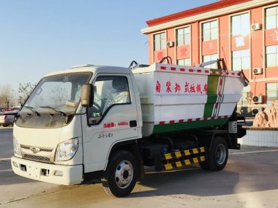 self dumping garbage truck